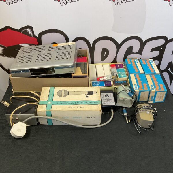Humax MPEG2 player with vintage microphone and photographic lights.