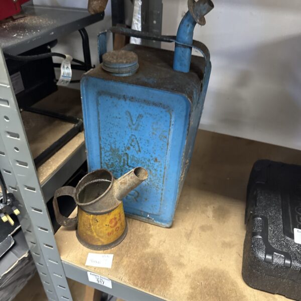 Vintage Shell oil can with handle and spout.