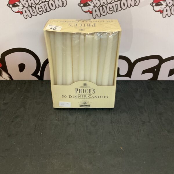 Lot of fifty unlit Prices dinner candles in original packaging.