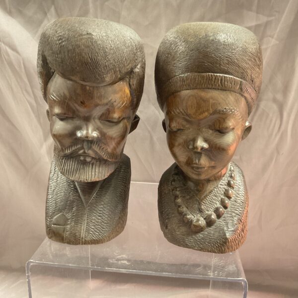 Pair of antique African carved ebony heartwood busts.
