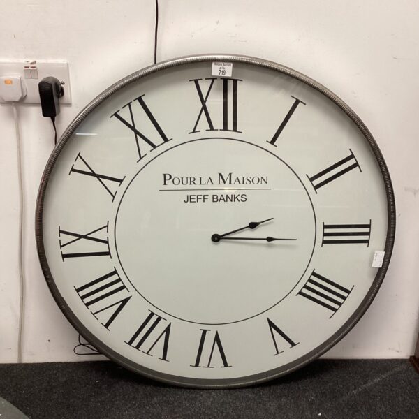 Large Jeff Banks Pour La Maison metal wall clock with bold numerals.