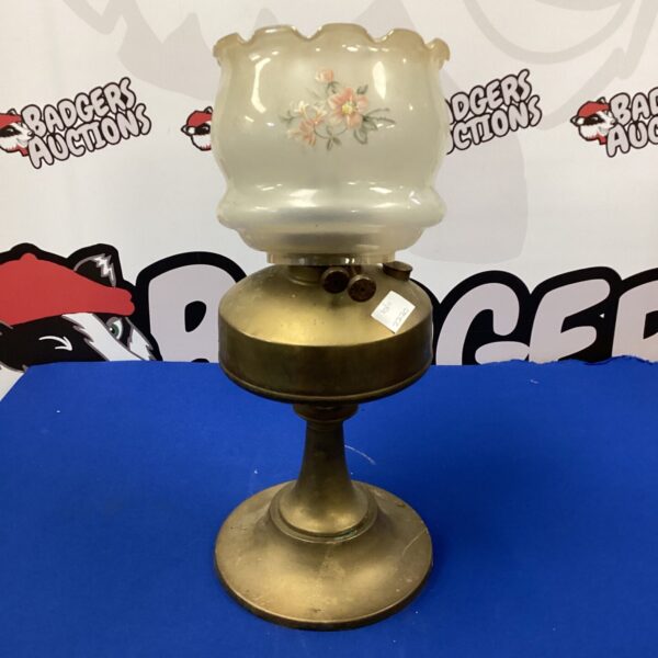 Vintage paraffin table lamp with floral glass shade and brass base.