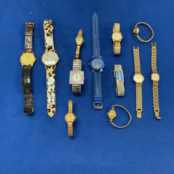 Vintage watch lot featuring various styles and brands.