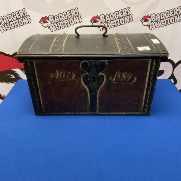 Antique wooden chest with a hinged lid, vintage storage solution.