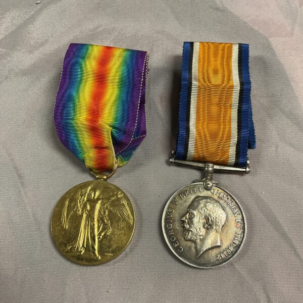 WW1 Durham Light Infantry medal pair with ribbons displayed.