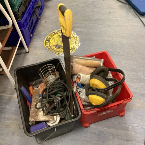 Assorted hand tools in a plastic storage box, mixed tool lot.