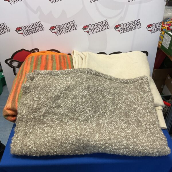 Lot of three large vintage blankets for warmth and style.