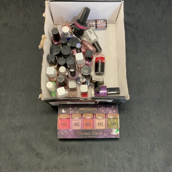 Assorted nail polish lot with various colours and finishes.