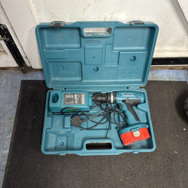 Vintage Makita 6391DWDE cordless drill set in carrying case.