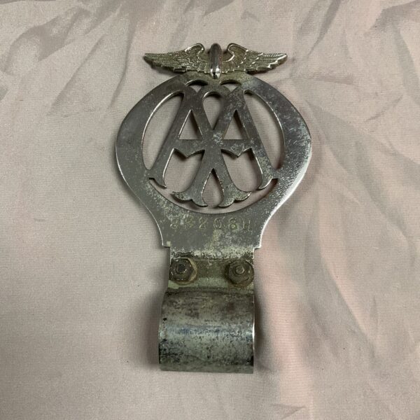 Vintage 1938 AA car badge, classic automotive emblem.