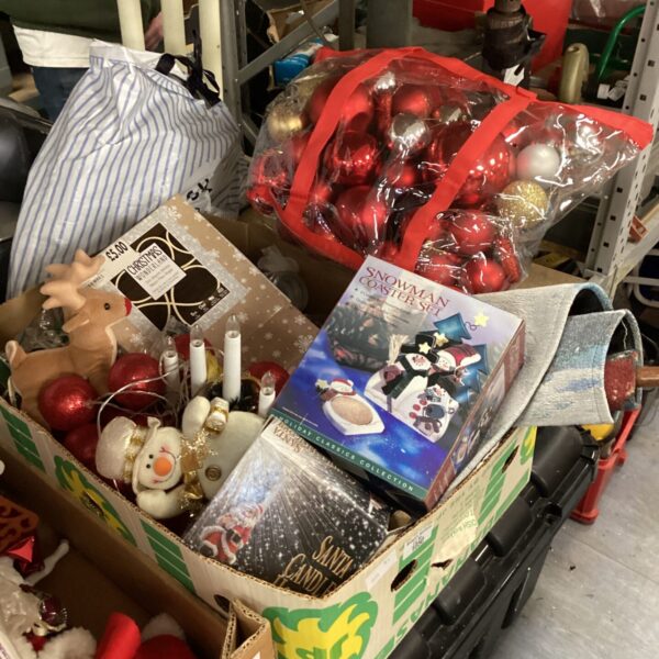 Large box of assorted Christmas decorations and baubles.