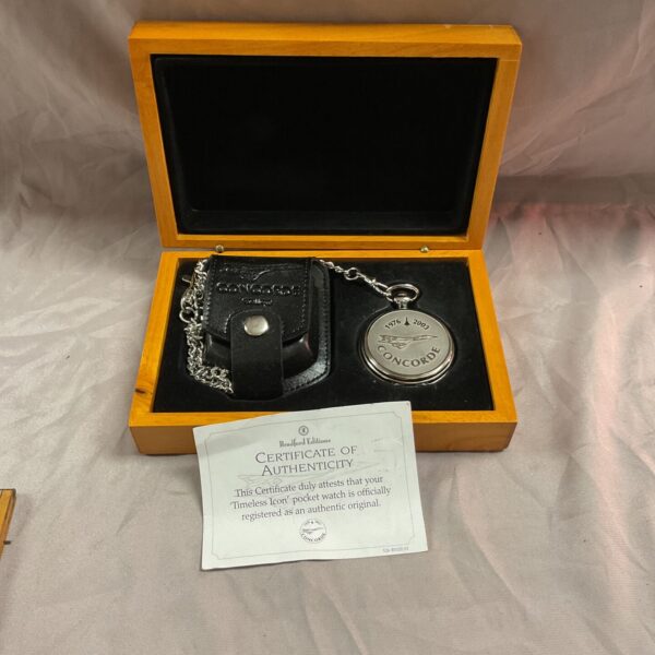 Concorde pocket watch in display case with certificate.