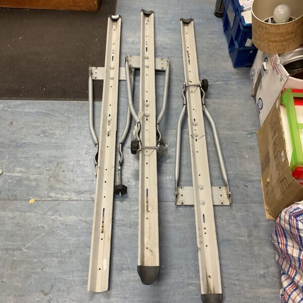 Roof mounted vehicle bike rack for carrying bicycles.