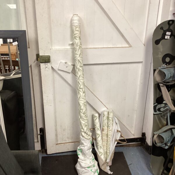 Laura Ashley wallpaper and fabric roll with floral pattern.