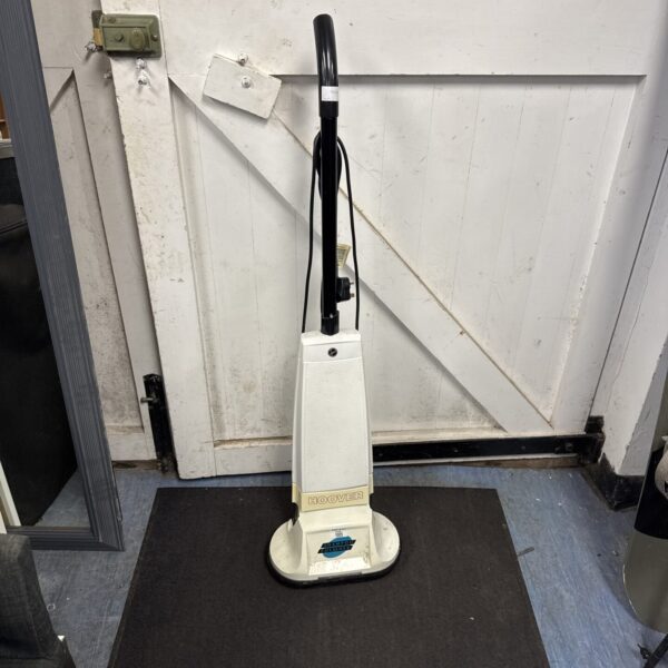 Vintage Hoover floor polisher for cleaning hard floors.