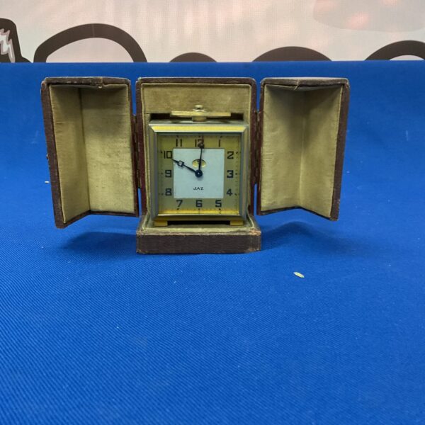 Vintage brass Jaz travel clock with Art Deco style.