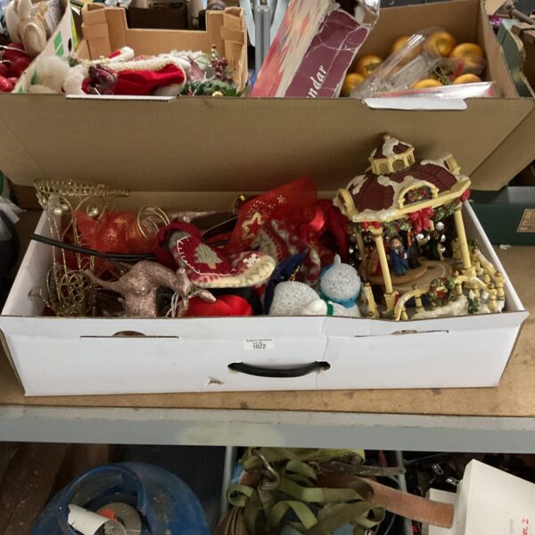 Mixed lot of vintage Christmas decorations in a cardboard box.