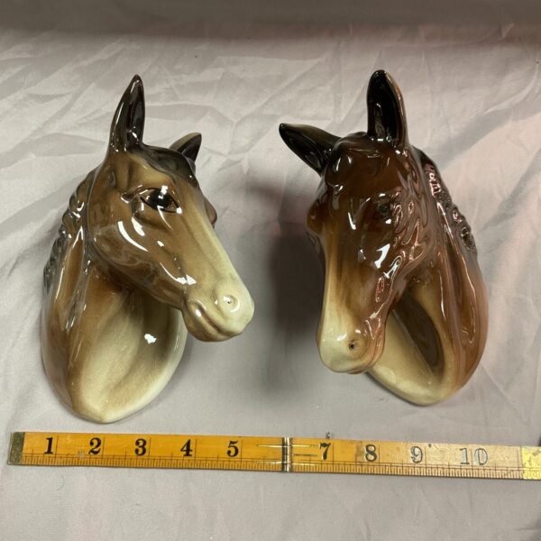 Two ceramic wall mount horse heads
