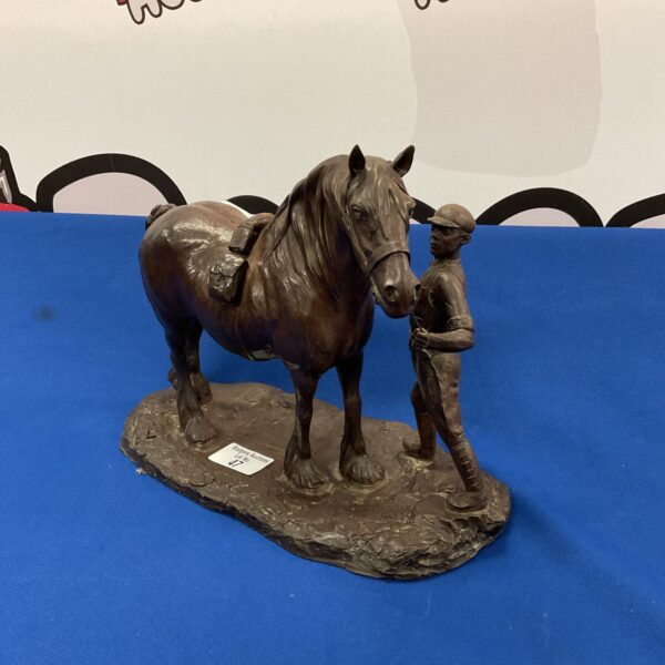 Detailed bronzed resin horse and farrier sculpture by H Donaldson.
