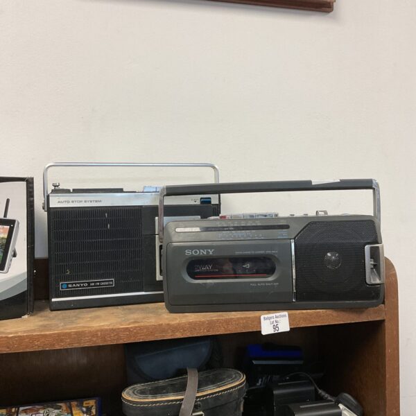 Vintage Sony and Sanyo cassette players, retro portable radios.