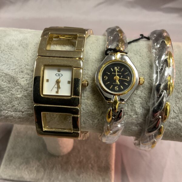 Vintage CH3 square-faced wristwatch in gold tone.