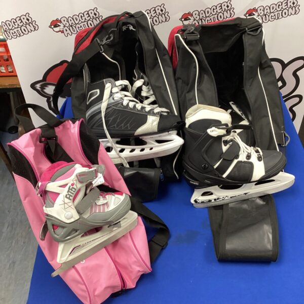 Pink children's SFR ice skates in a lot of three.