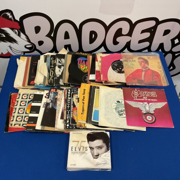 Vintage Elvis Presley vinyl records and CD box set collection.