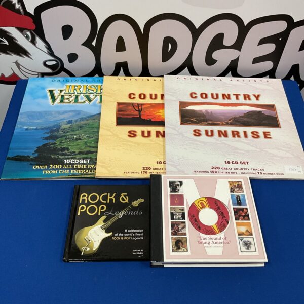 Assorted vinyl records including Motown and country music albums.