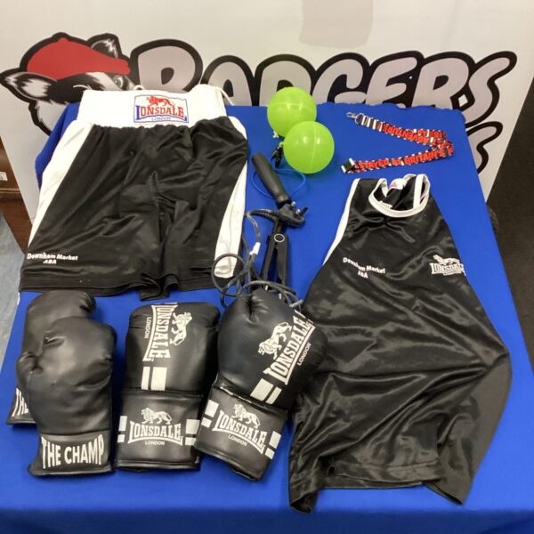 Lonsdale boxing set with vest, shorts, and gloves displayed.