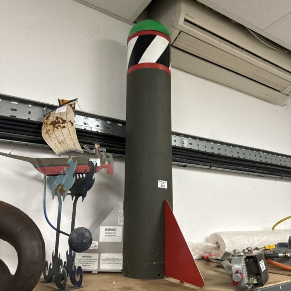 Unique converted lighting post missile sculpture, industrial art piece.