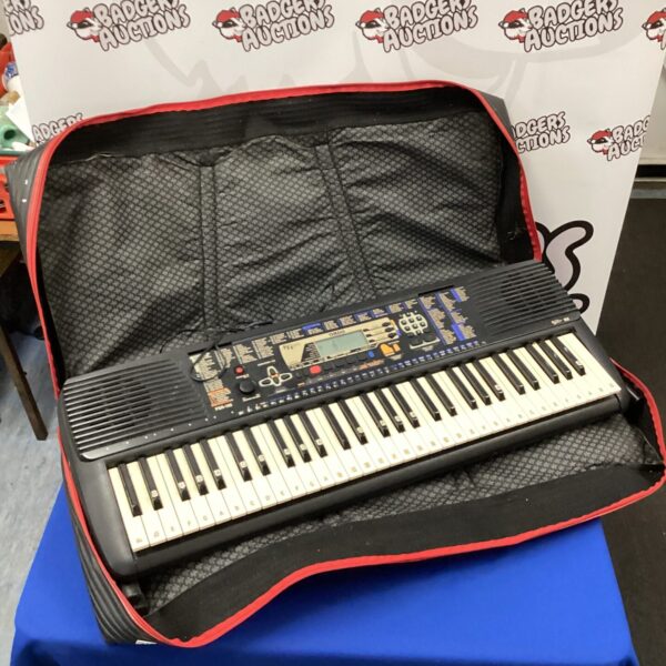 Yamaha PSR-195 keyboard with stand and bag, electronic musical instrument.