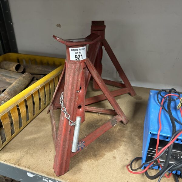 Pair of used steel car axle stands for vehicle maintenance.