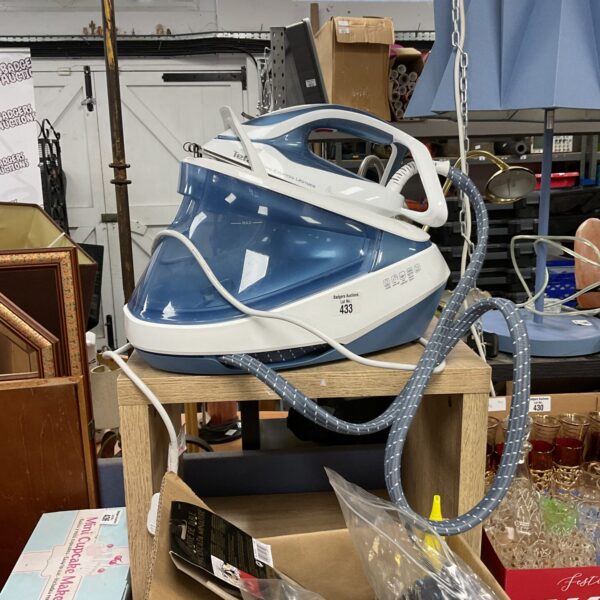 Tefal Pro Express Ultimate steam iron, side view.