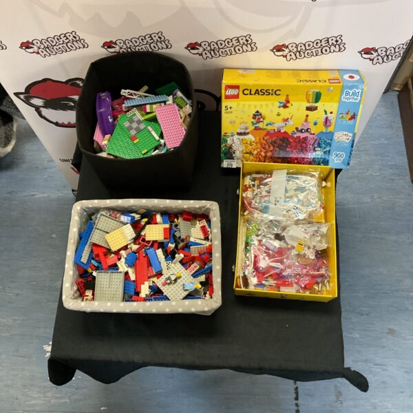 Three boxes of mixed Lego building blocks and classic sets.