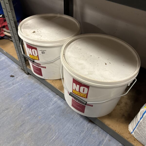 Two tubs of No Nonsense levelling compound for floor levelling.