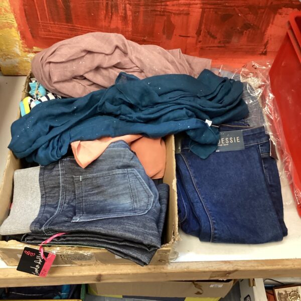 Mixed clothing lot with jeans and scarves.