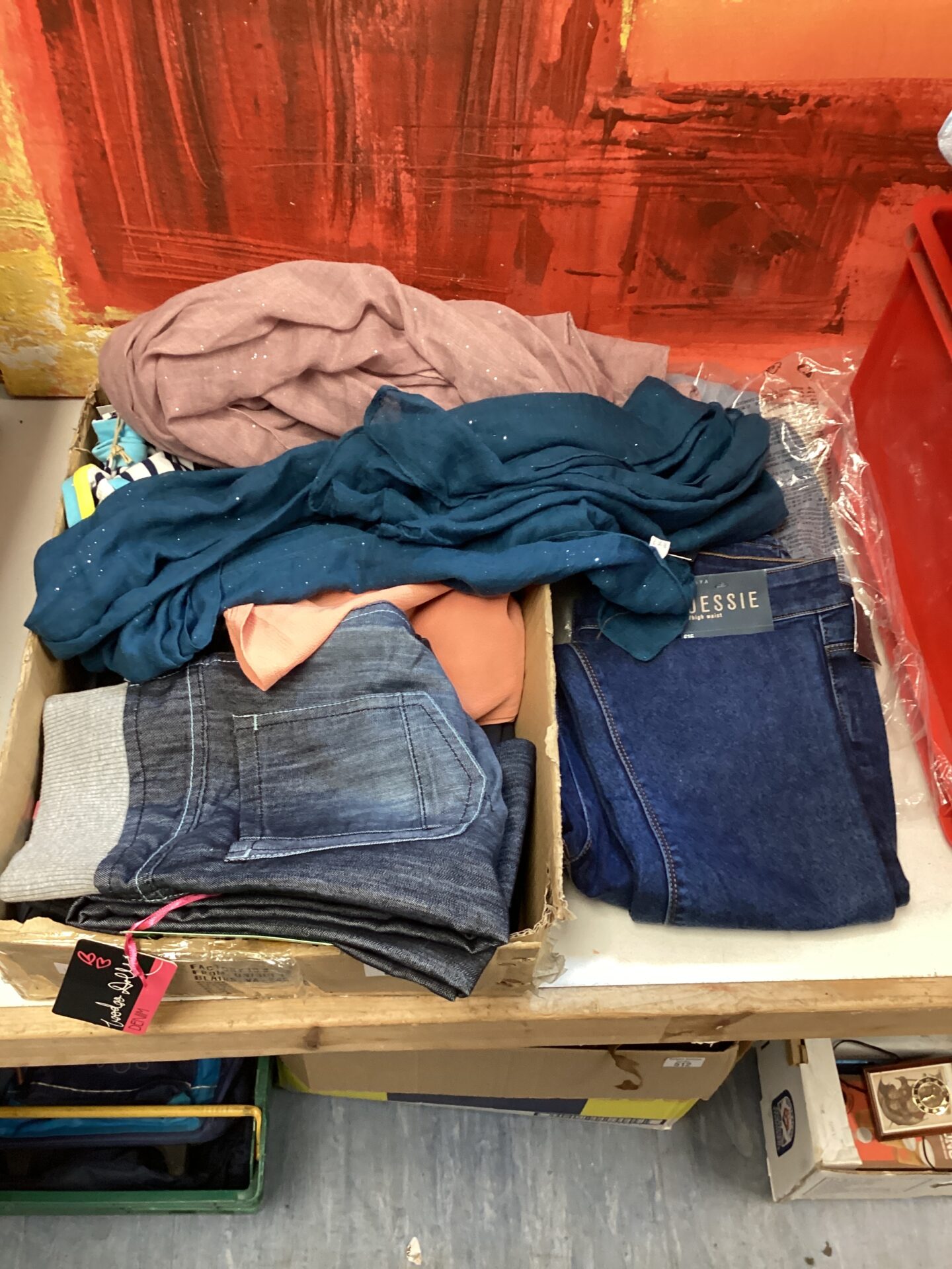 509 Tray of new clothes inc voodoo dolls jeans, luxe scarves & jessie high waste jeans