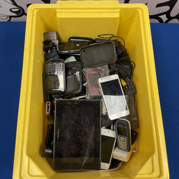 Mixed lot of mobile phones including BlackBerry, Nokia, and Samsung.