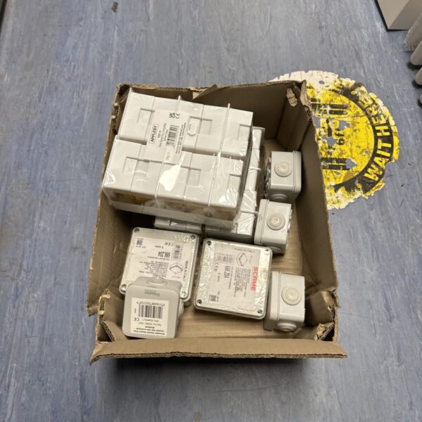 Lot of new plastic electrical dry lining boxes for installation.