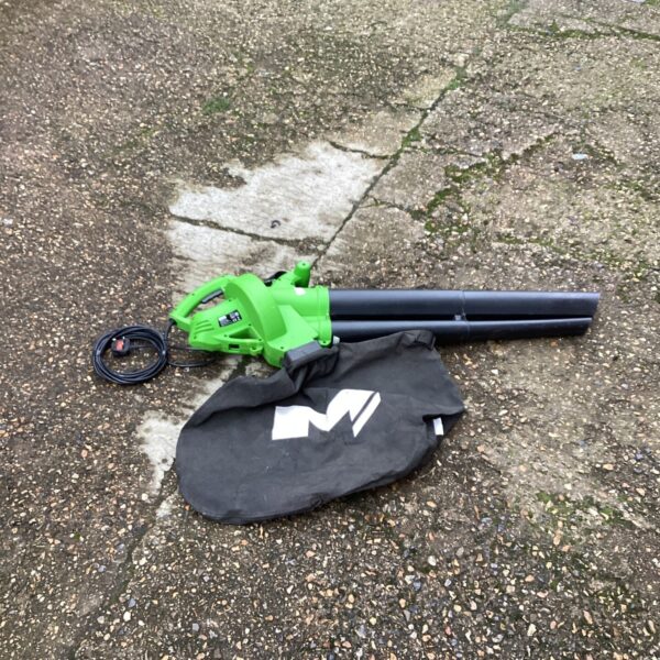 Handheld garden leaf vacuum with collection bag for outdoor cleaning.