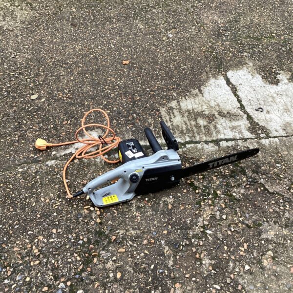 Used Titan electric chainsaw for garden and DIY projects.