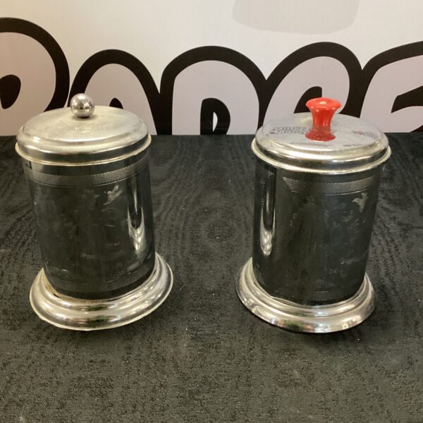 Vintage stainless steel tea jar for storing loose leaf tea.