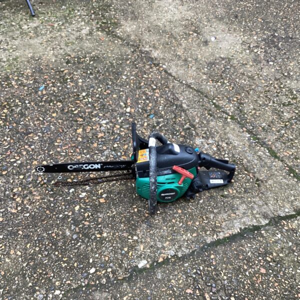 Qualcast petrol chainsaw for garden maintenance and DIY projects.