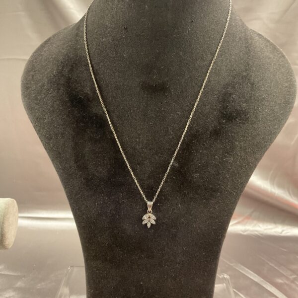 Delicate 925 silver floral pendant necklace on a silver chain.