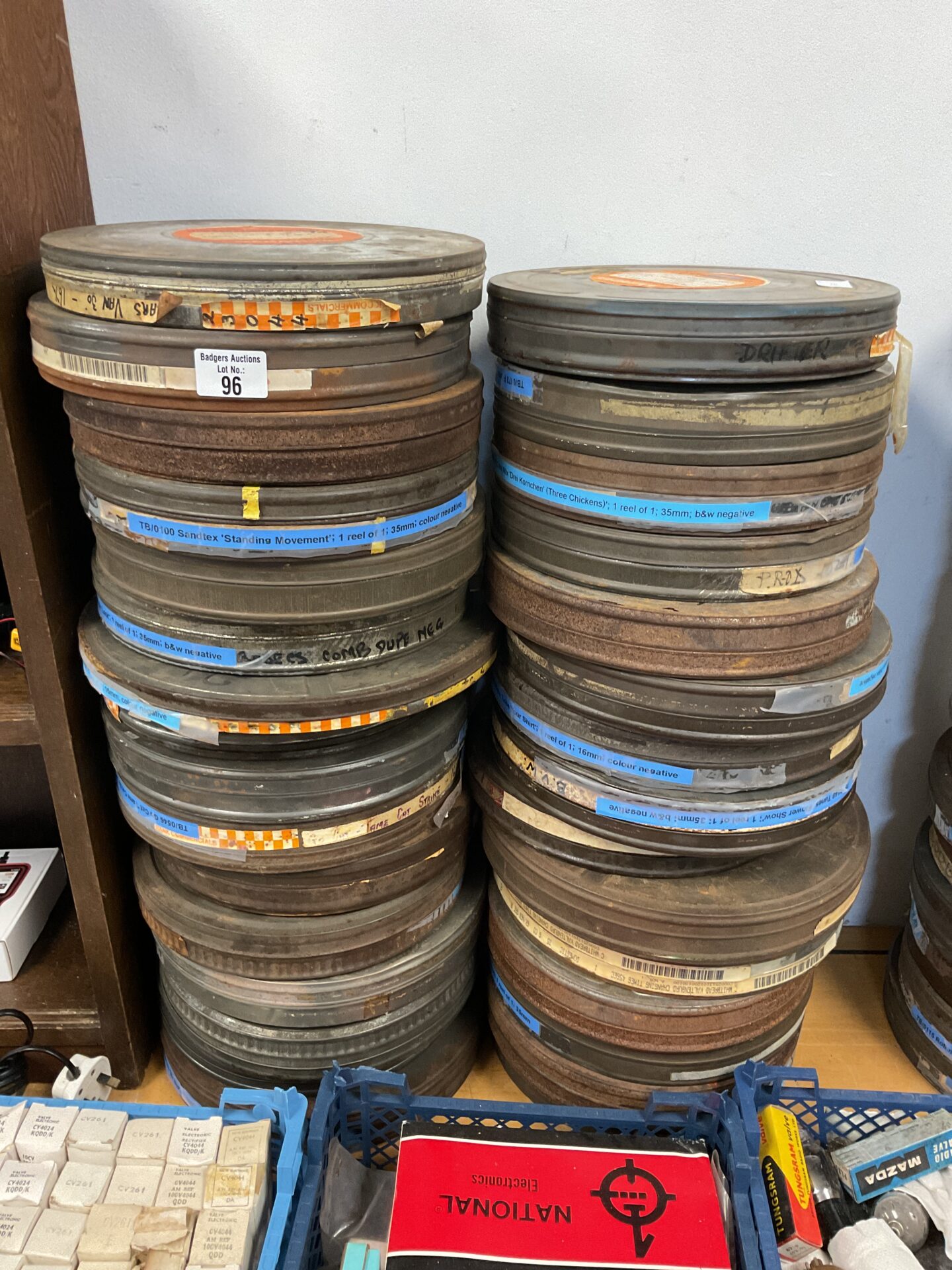 096 Collection of vintage 35mm movie reels and cans (advertisements)
