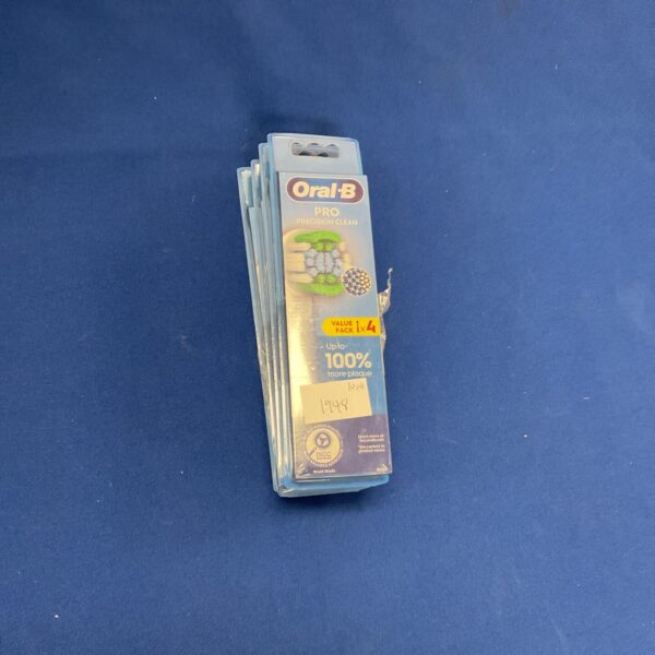 Four boxes of Oral B Pro Precision Clean toothbrush heads in original packaging.