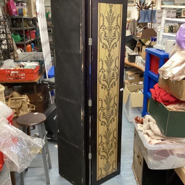Vintage six-panel privacy screen with floral design for room division.
