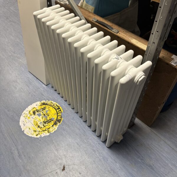 Vintage cast iron radiator for home heating and restoration.