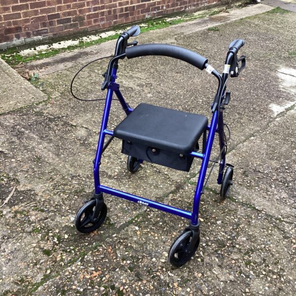 Blue Drive walking aid trolley with a padded seat.
