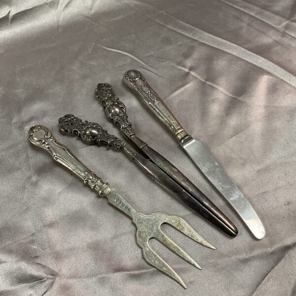 Antique silver glove stretchers and knife fork set, hallmarked silver cutlery.